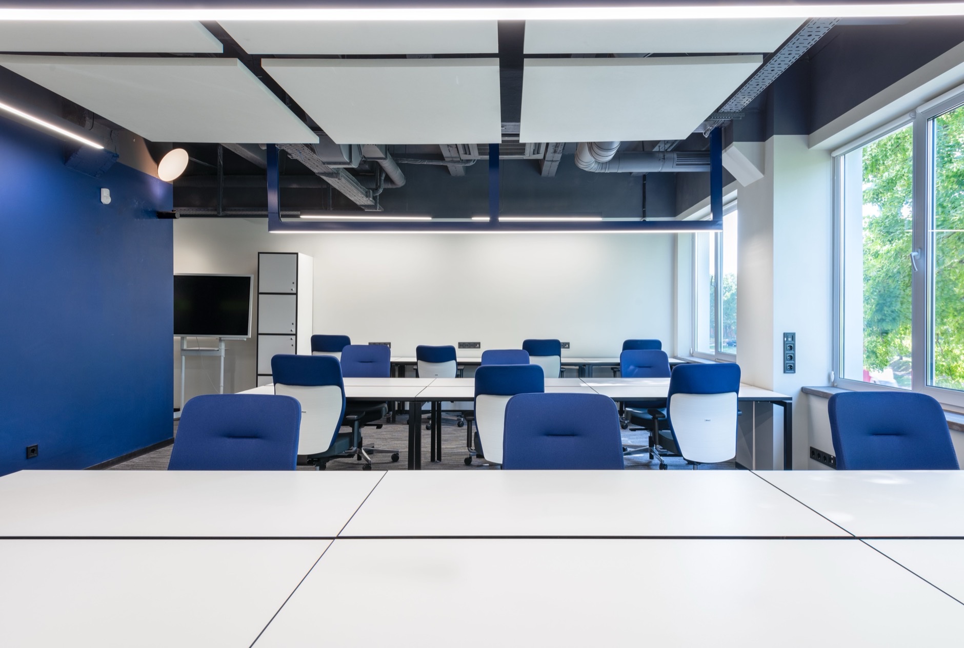 Modern CPA office conference room with desks and chairs